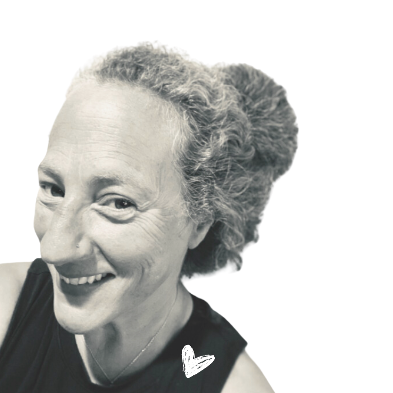 Dr. Jodi Dinnerman smiling in a black-and-white portrait